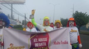 Clowns on a protest walk from Santiago to Higuey 