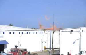 Brugal warehouse fire extinguished, losses in the millions